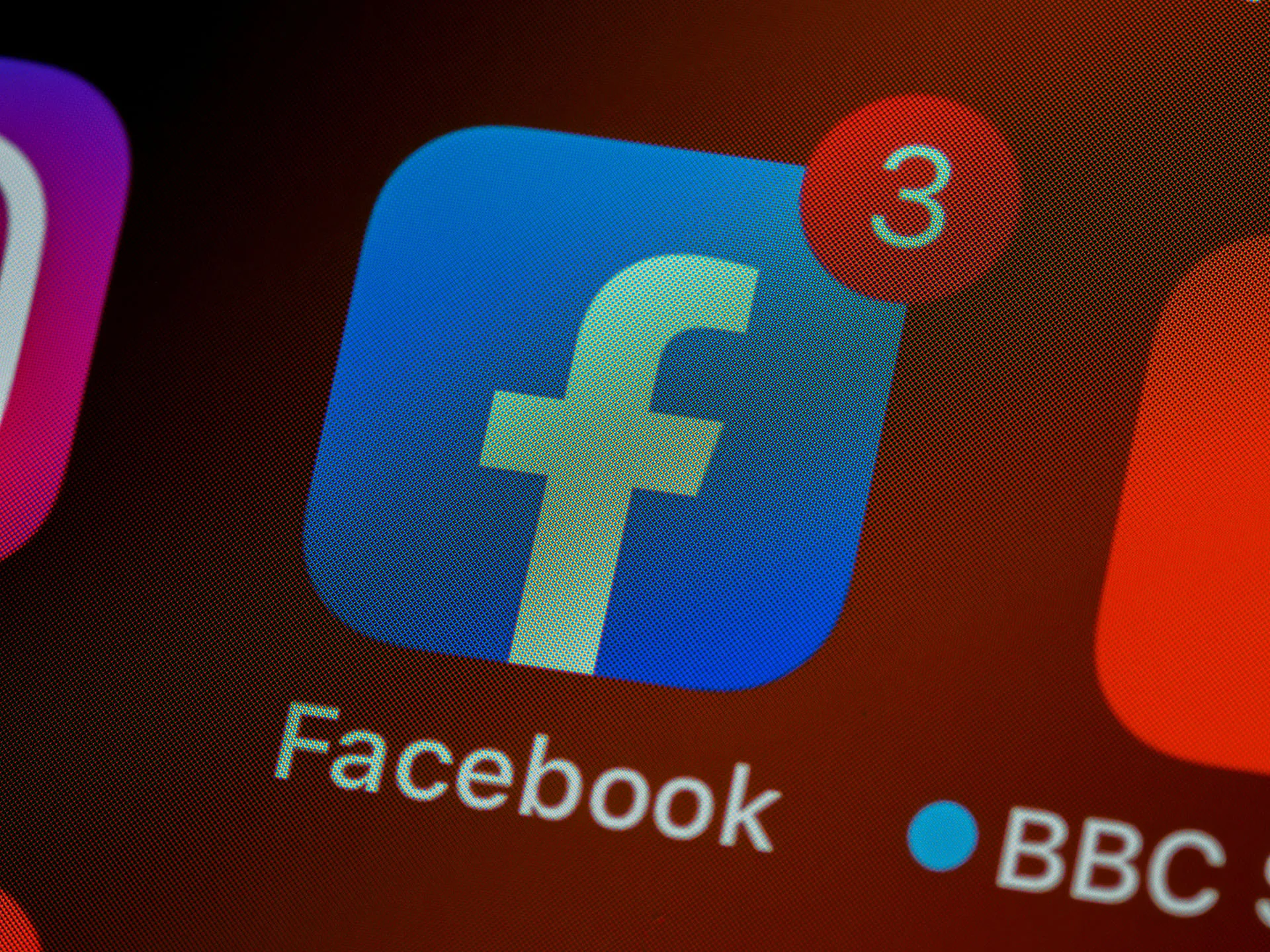  Close up of the Facebook app icon on a smartphone screen