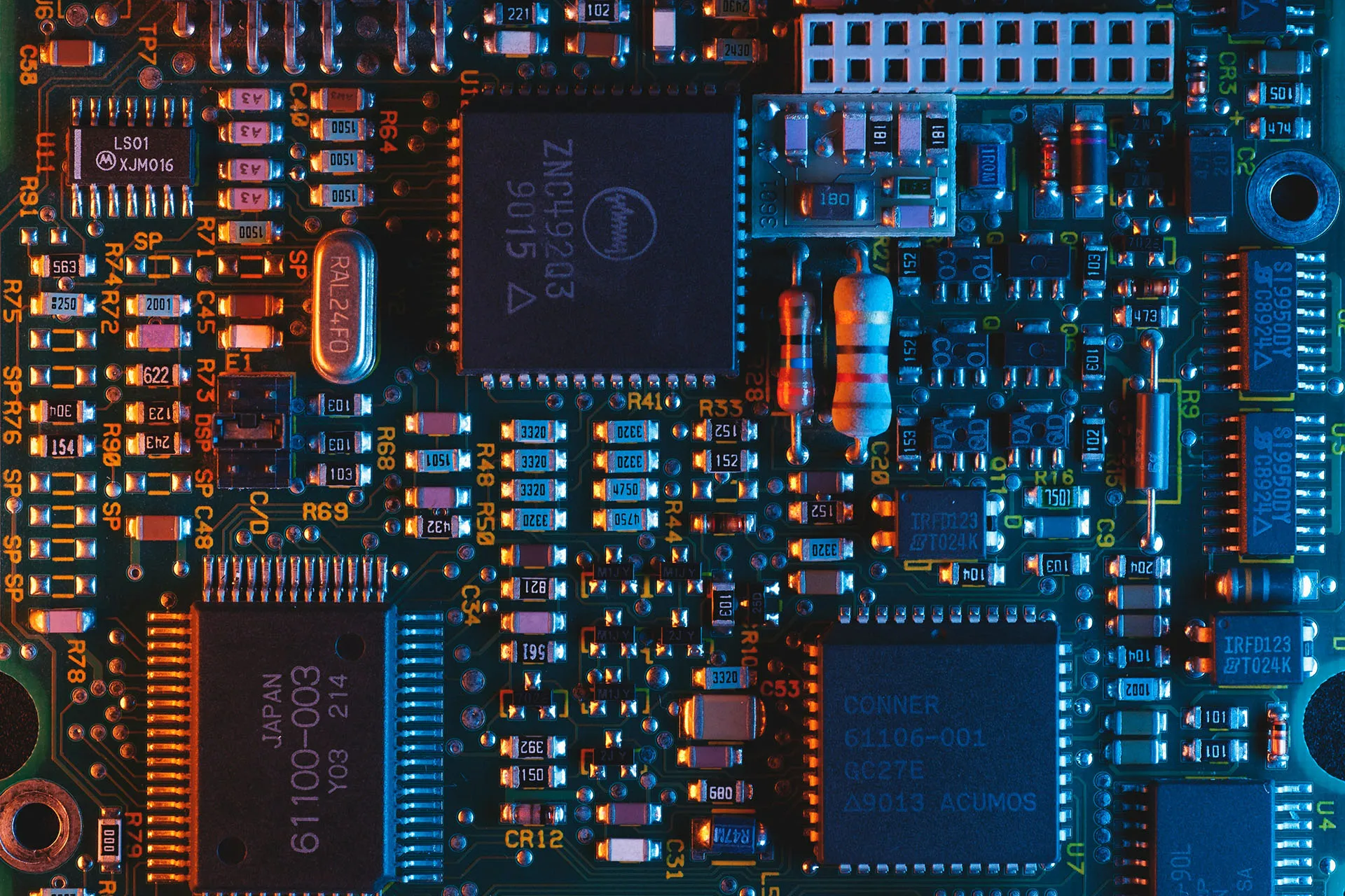  Technology computer circuit board with orange and blue lighting