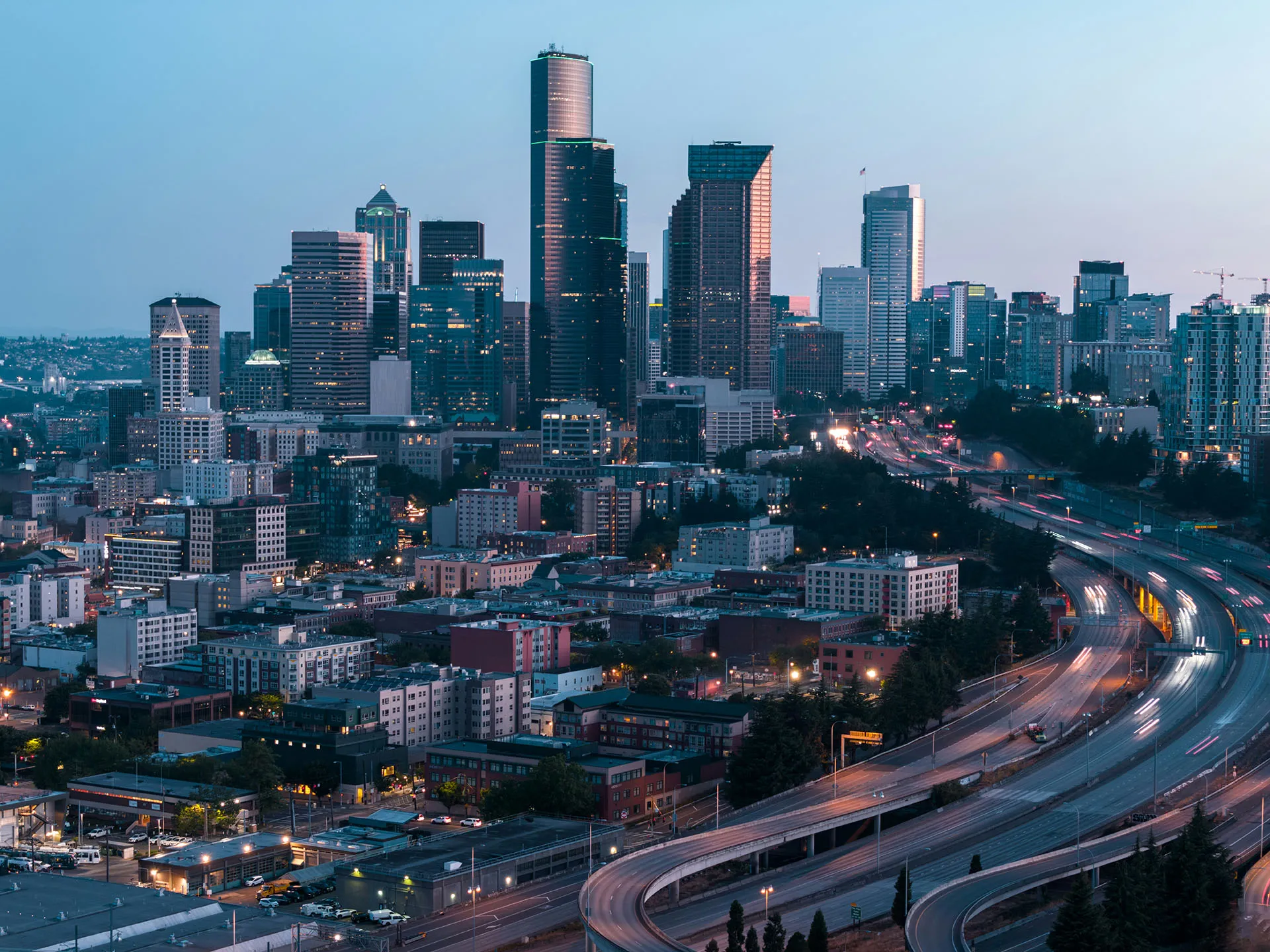  Seattle cityscape lit up at dusk
