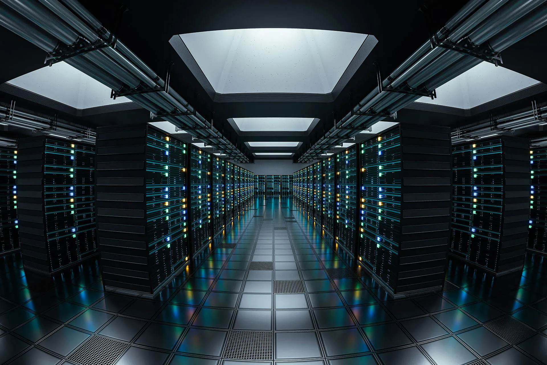  Rows of illuminated server racks in a modern data center with overhead lighting and reflective flooring.